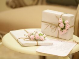 two pink and white floral boxes